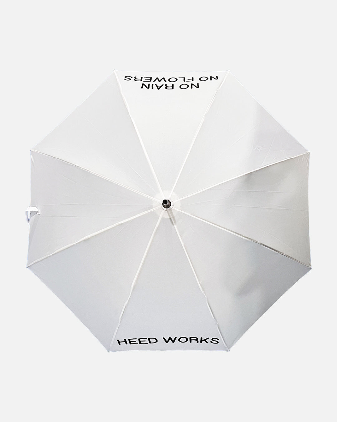 White umbrella with text on a white background