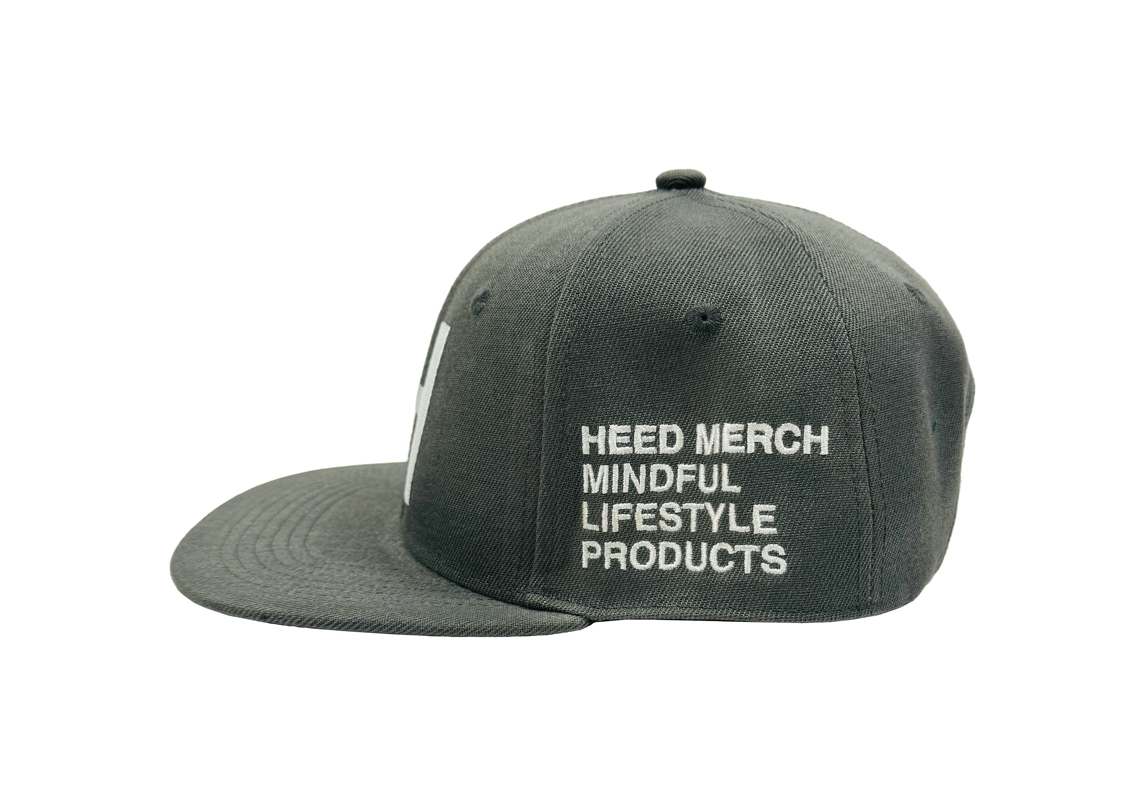 Original style baseball cap with flat peak. Snapback closure. Available in navy, grey or black. White embroidery detail. Mental Health and Self Care Streetwear Clothing Brand.